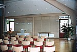 large conference room with glued laminated timber trusses